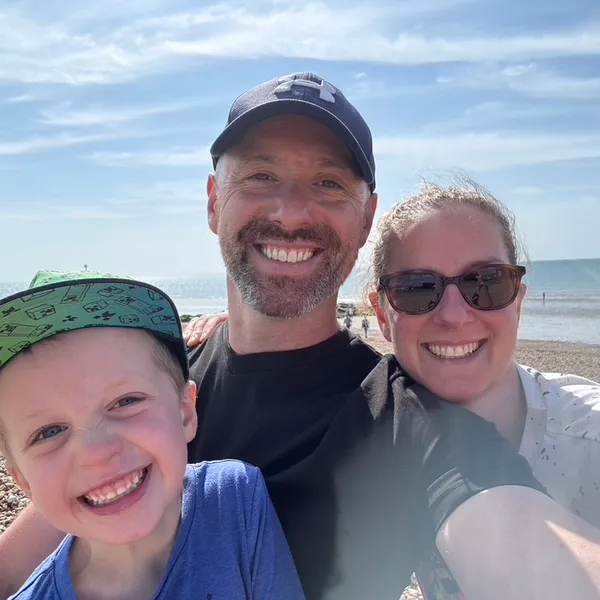 George with his family at the beach